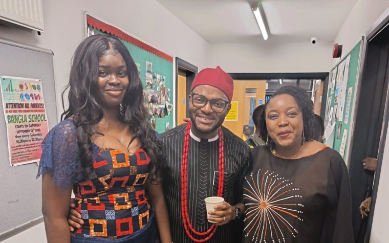 Igbo Union Northamptonshire - Three members in Igbo dress standing together at a gathering
